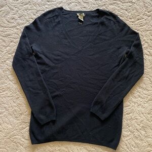 Black V-neck, cashmere sweater with detailed trim